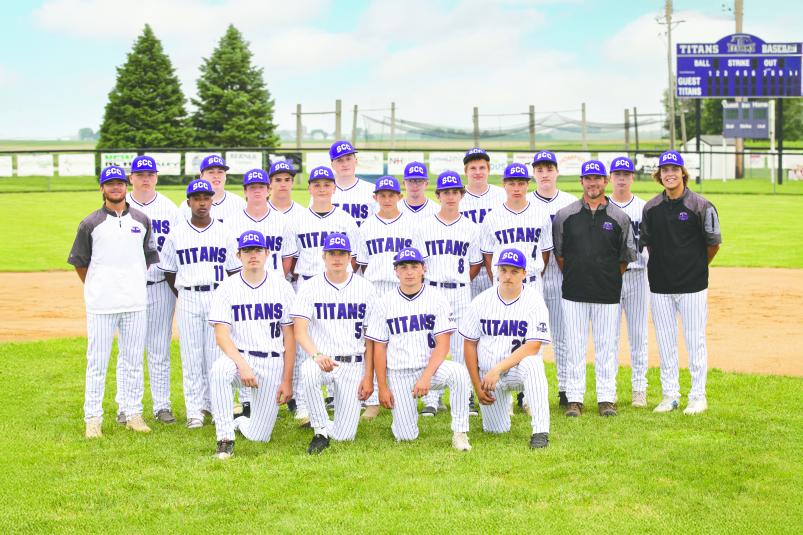 A group photo of the SCC 2025 baseball team and their coaches, taken outside on the ballfield on a sunny day.